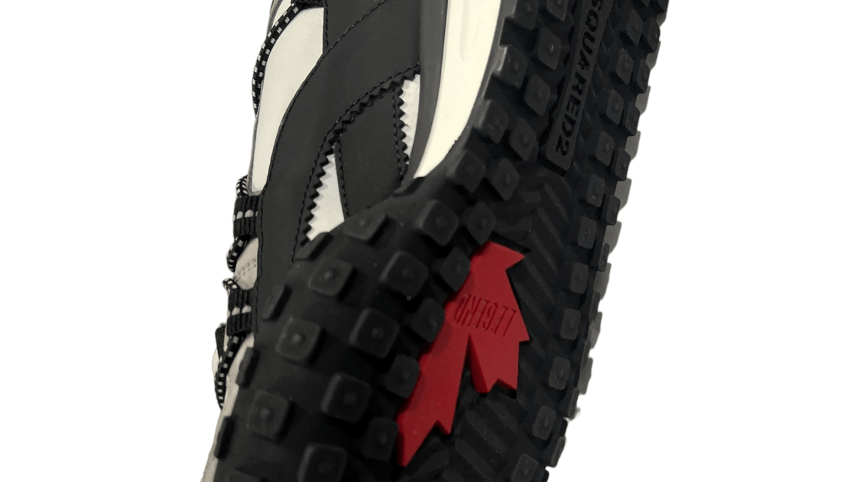 Logo Dsquared2 en gros plan sur une paire de sneakers authentifiée chez NB08, repère d'authentification