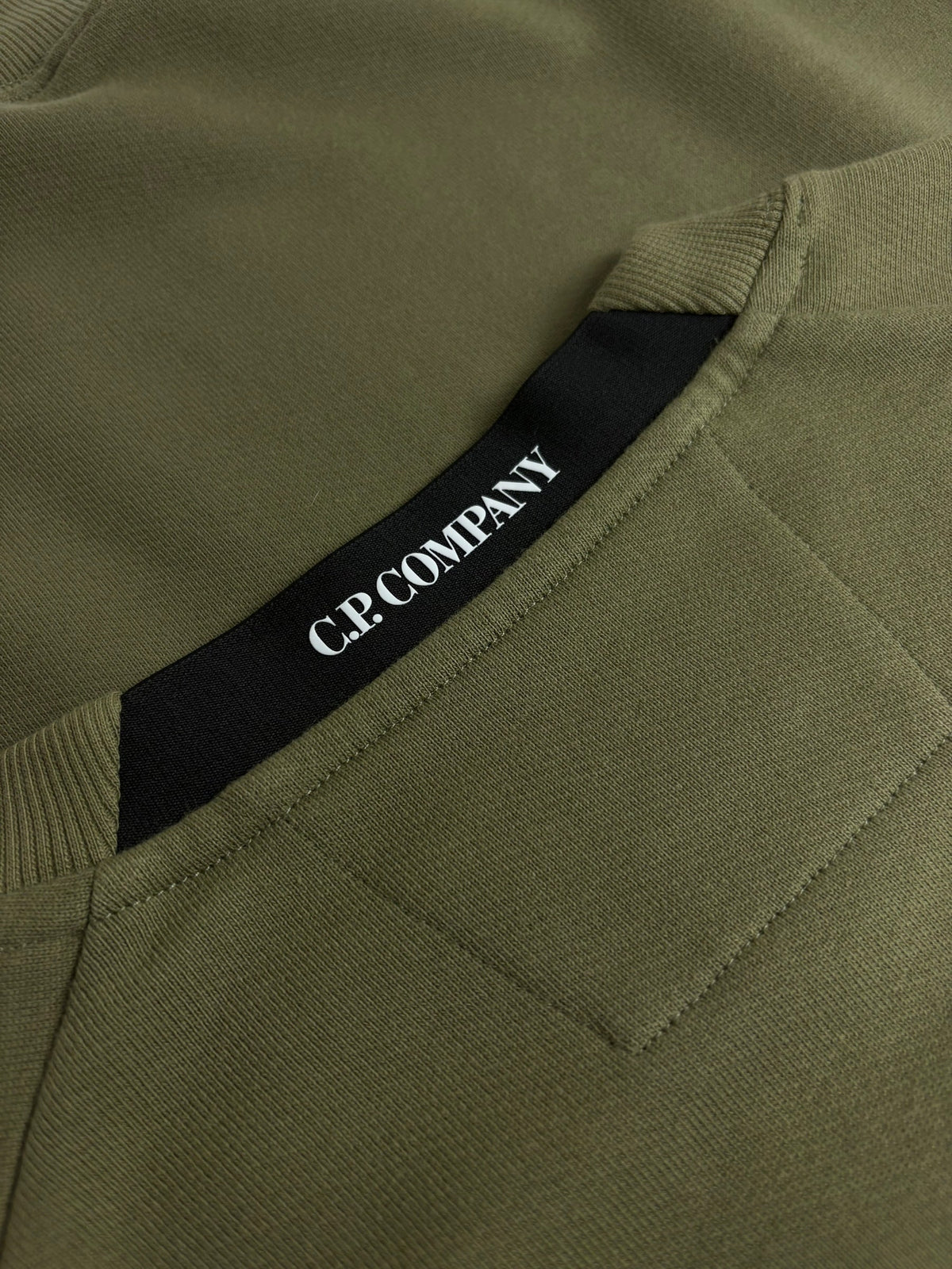 Sweat C.P Company kaki taille M - Logo et étiquette