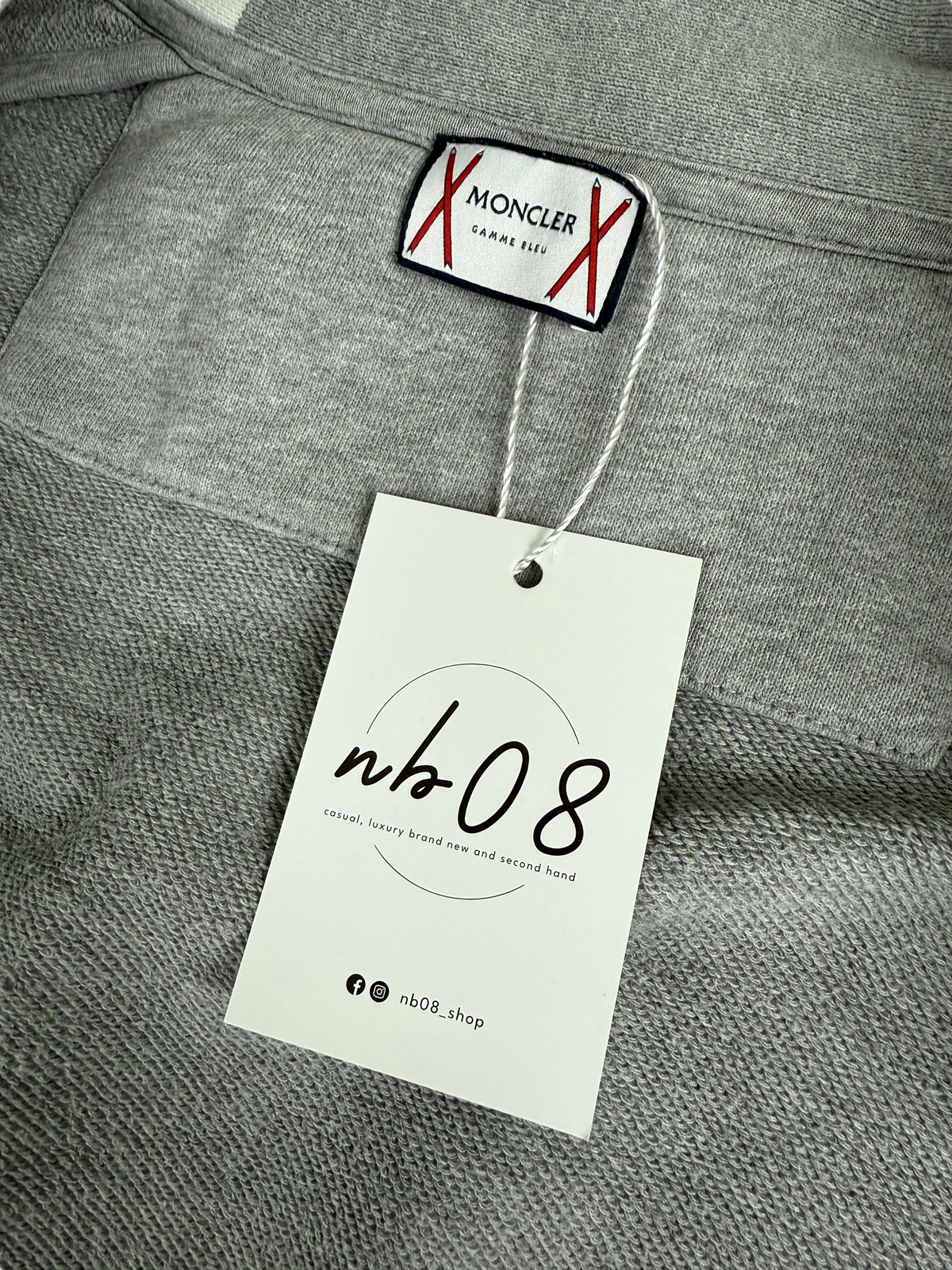 Gilet Moncler gris / blanc taille M - Logo et étiquette