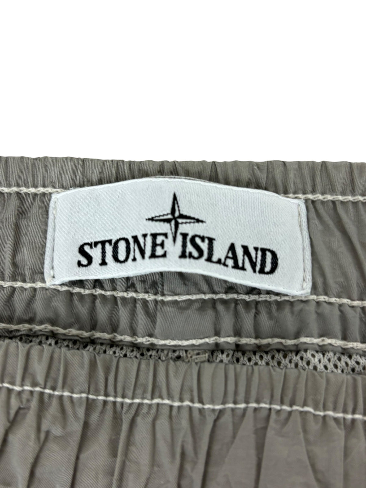 Pantalon Stone Island gris clair taille PANTALON W34 - Logo et étiquette