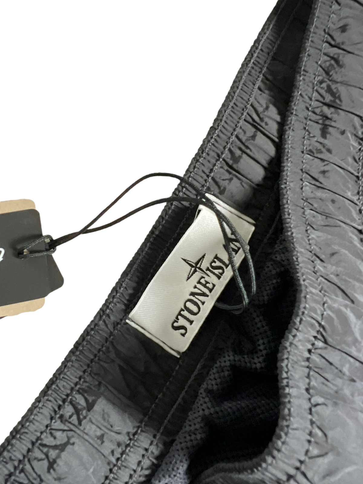 Short Stone Island gris taille S - Logo et étiquette