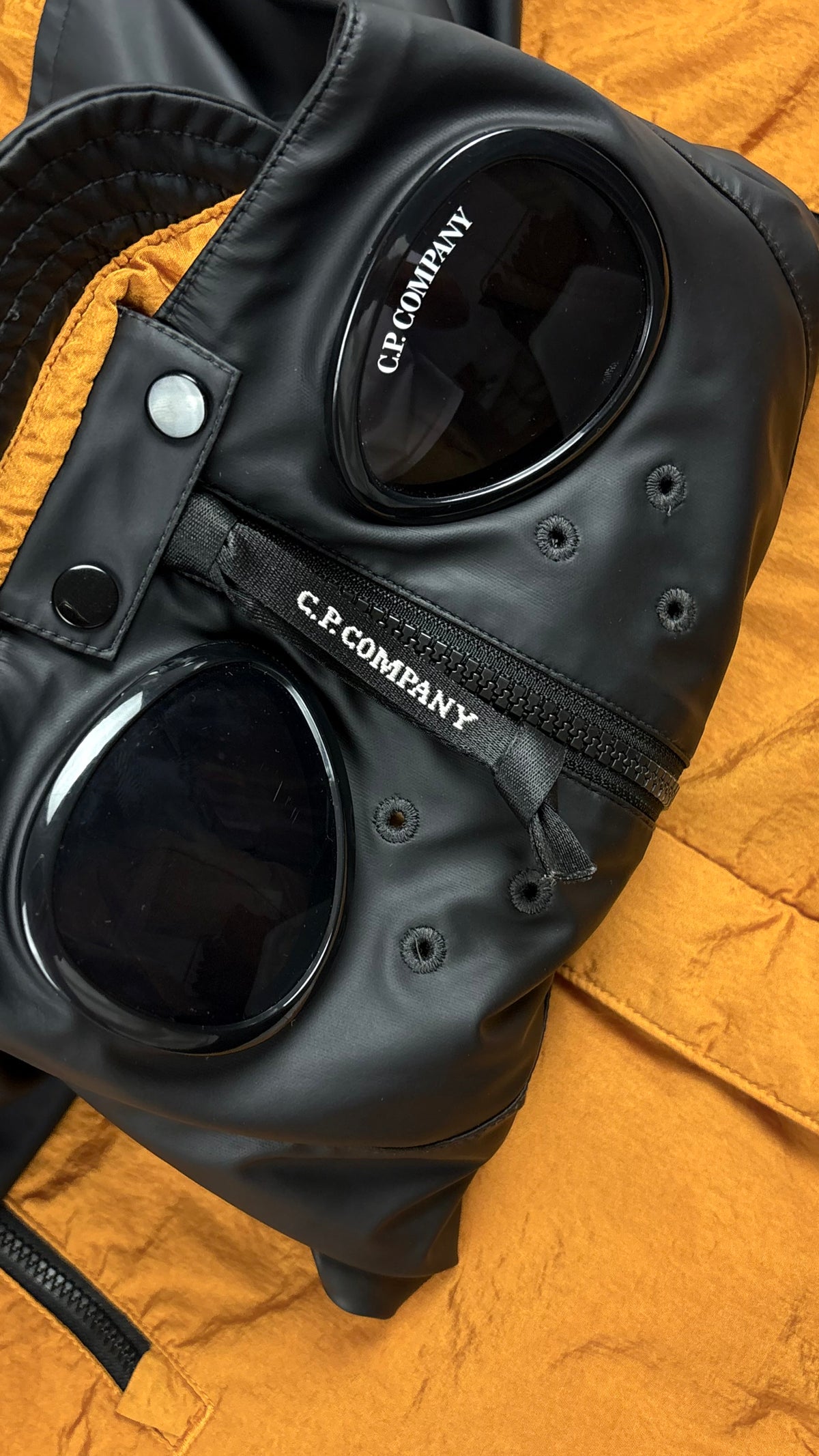 C.P Company Undersixteen Explorer Goggle jacket, camel and black, labels and finishing detail — view 3