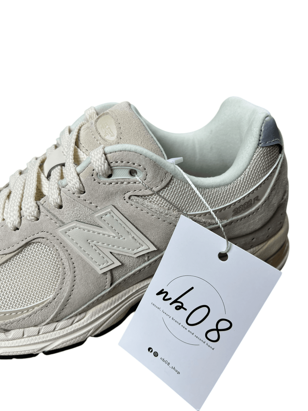 Sneakers New Balance M2002RCC crème, pointure 37 1/2 — vue de dos